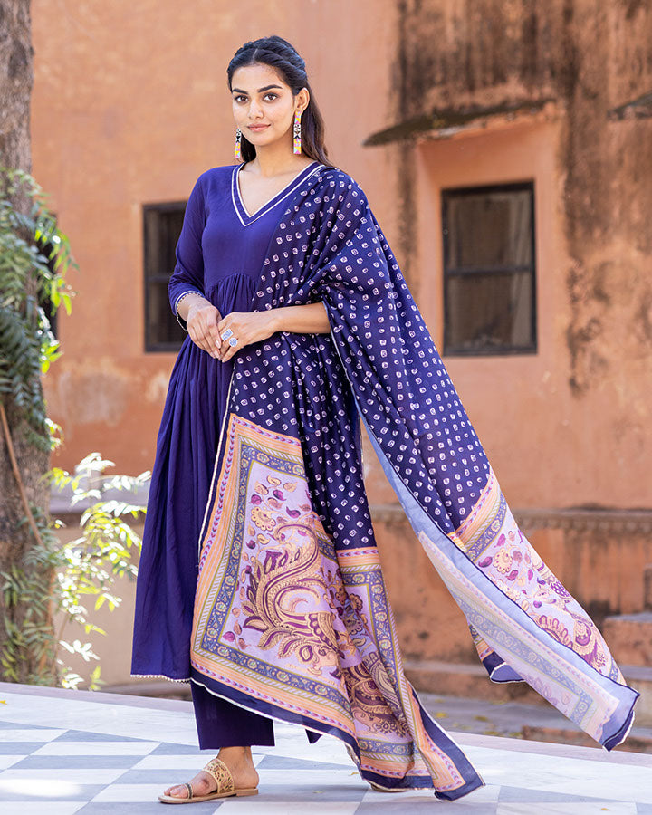 Traditional purple Kalmkari suit with azure accents
