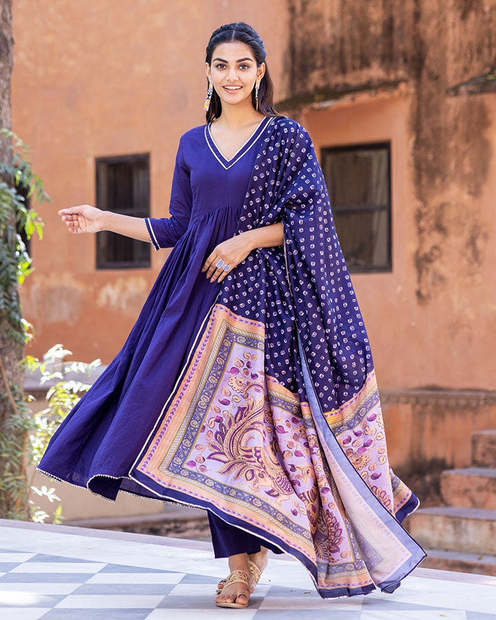 Purple suit featuring intricate azure Kalmkari designs