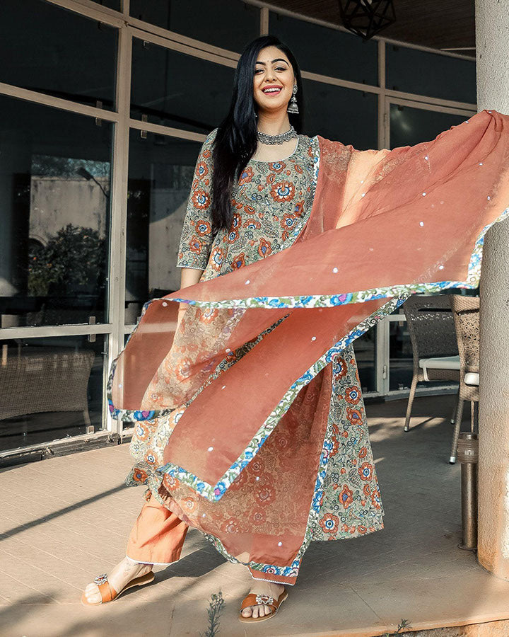 Brown cotton suit with intricate floral prints