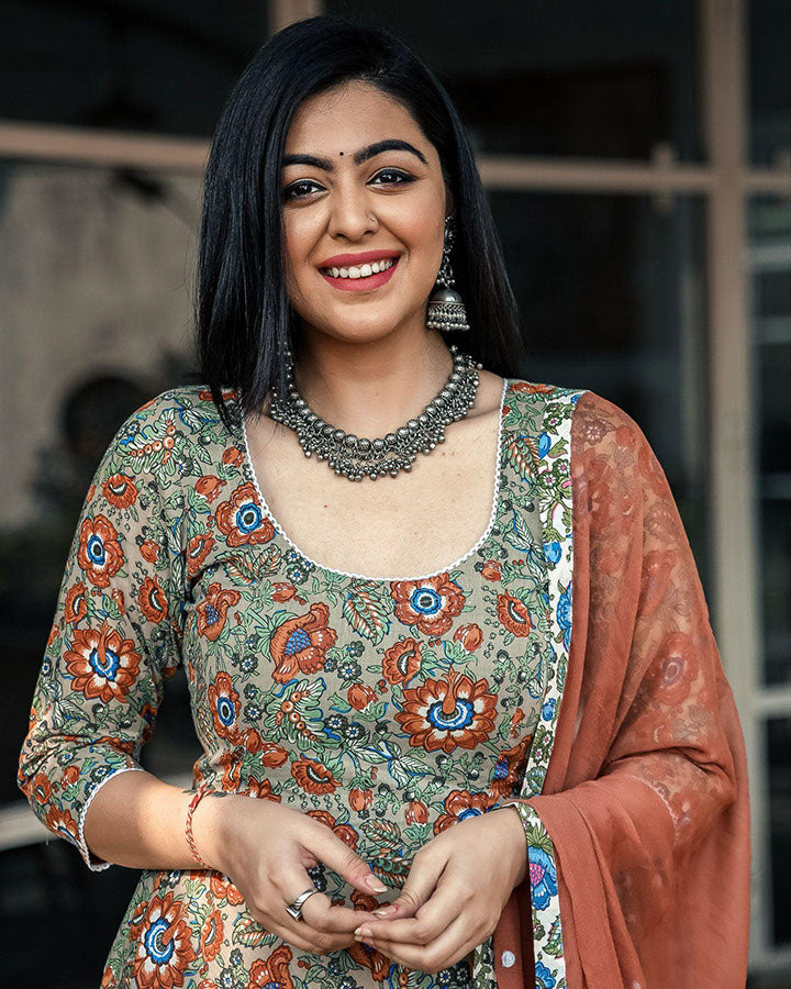 Trendy brown cotton suit with intricate floral motifs