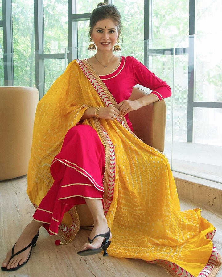 Stylish pink suit with delicate rayon berry designs