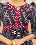 Black Striped Polka Peplum Top