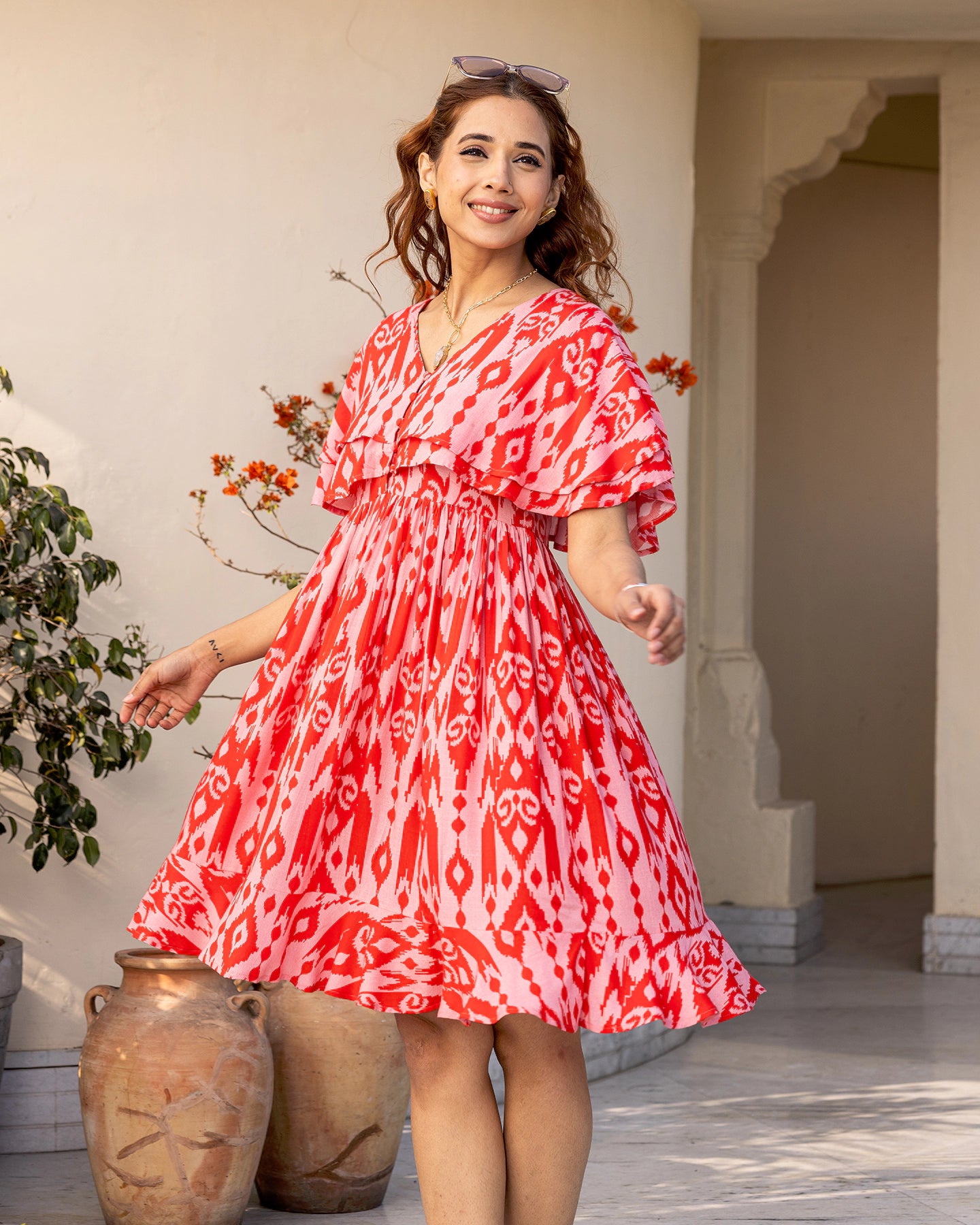 red ikat dress SLEEVELESS A LINE DRESS WITH EMBROIDERED POCKETS IN RED DOUBLE IKAT FABRIC