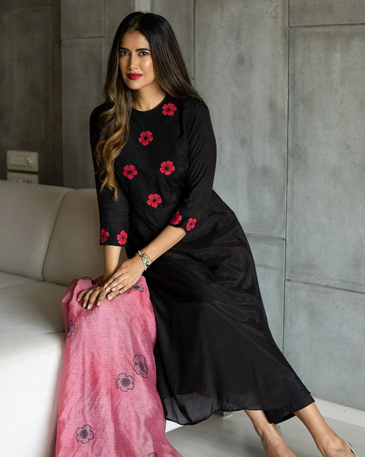 Trendy black muslin suit set with delicate pintuck patterns